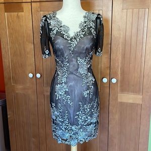 Karen Millen dress.  Sheer black with gray floral over blush slip. Size 4